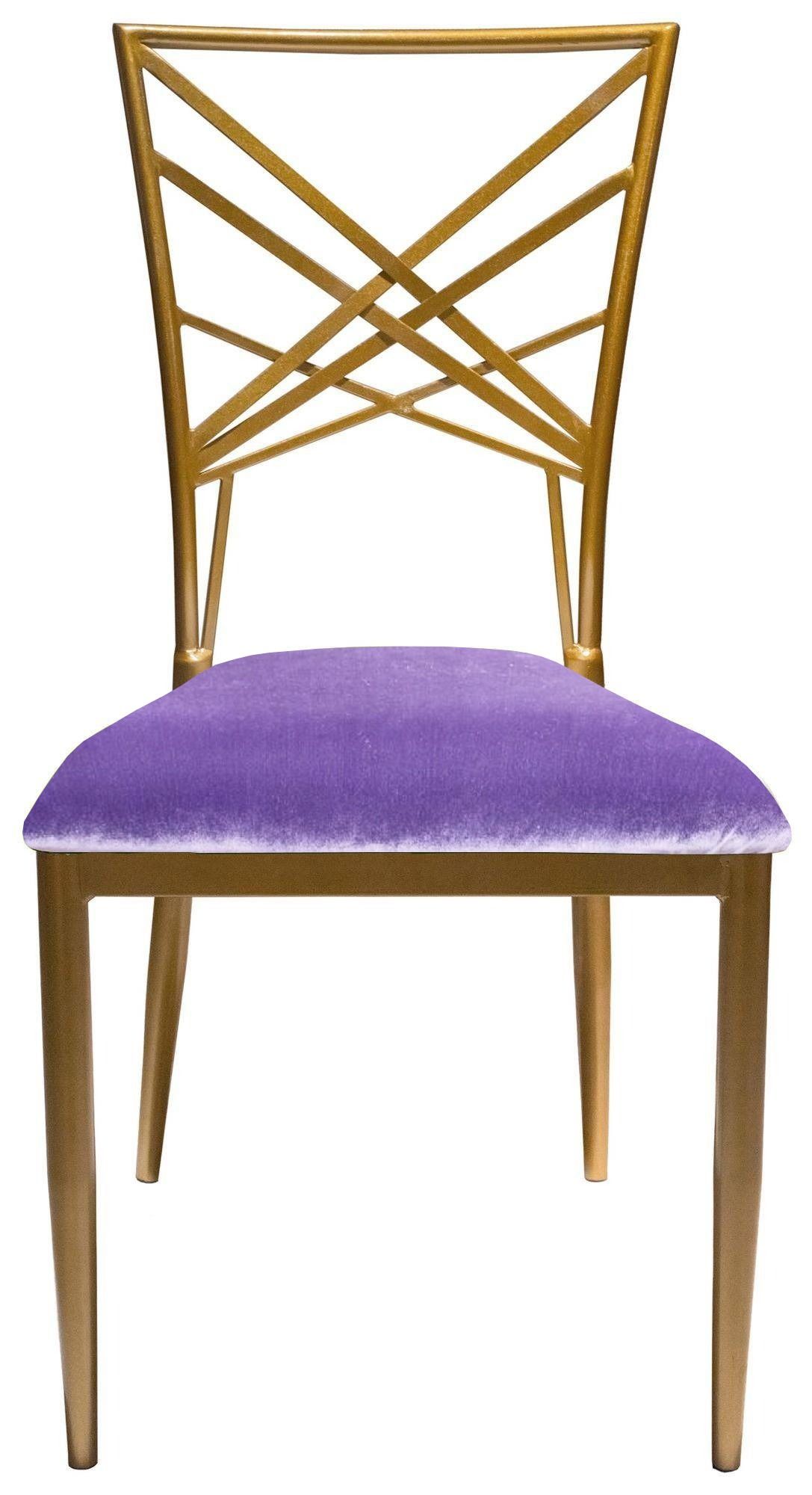 Gold lattice-back chair with a vibrant Ice Lavender velvet seat styled with matching accents and glossy tableware in a playful, luxurious setup.