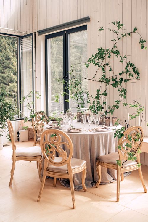 Artist’s Studio Setting — Round Table & Carved Chairs