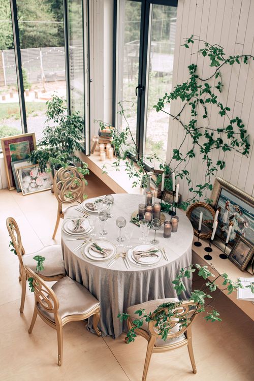 Artist’s Studio Setting — Round Table & Carved Chairs