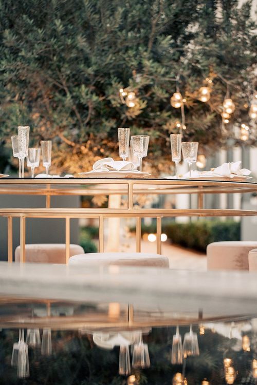 Beige candlelit table setting at round table