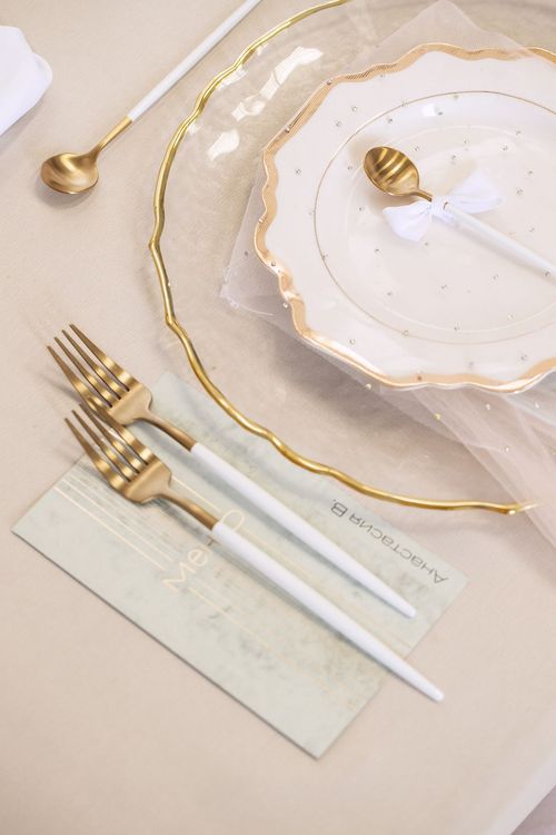 Beige table setting at rectangular table