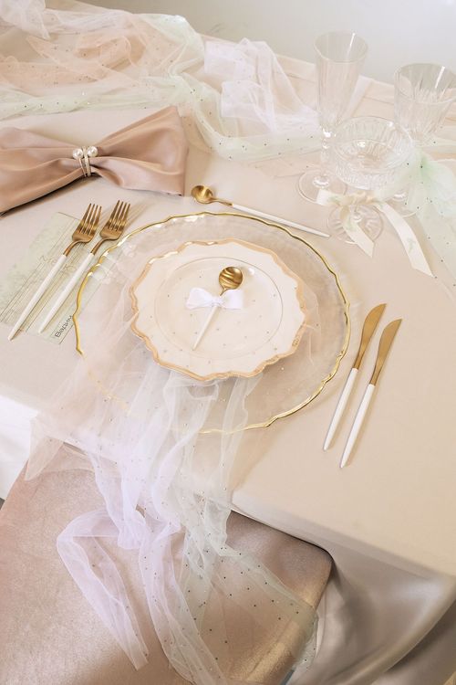 Beige table setting at rectangular table