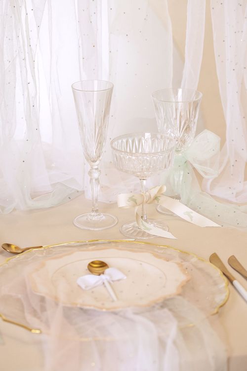 Beige table setting at rectangular table