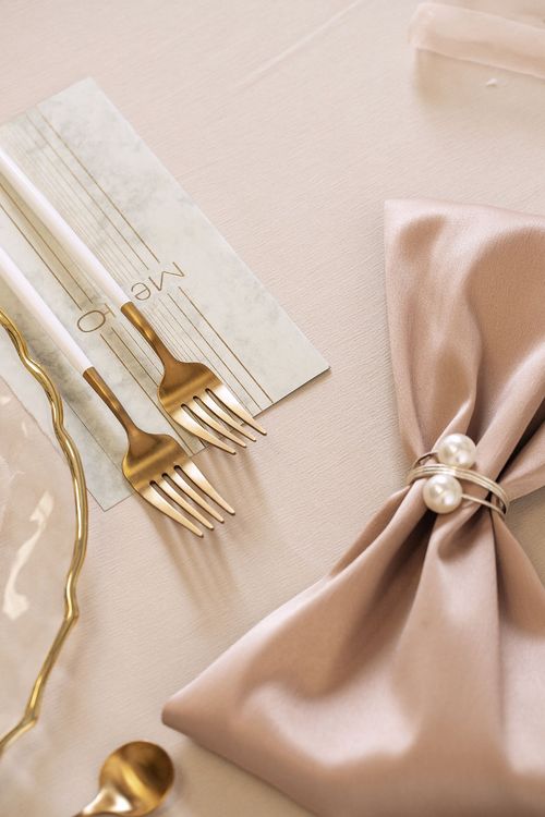Beige table setting at rectangular table