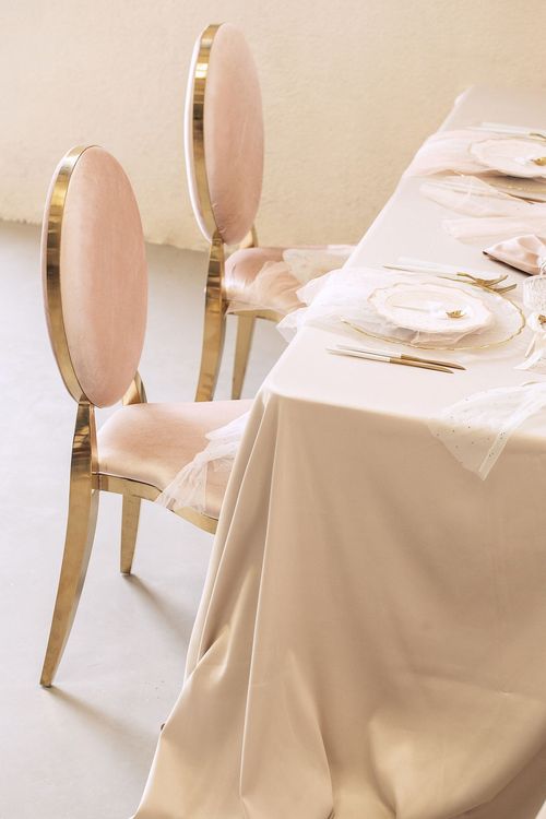 Beige table setting at rectangular table