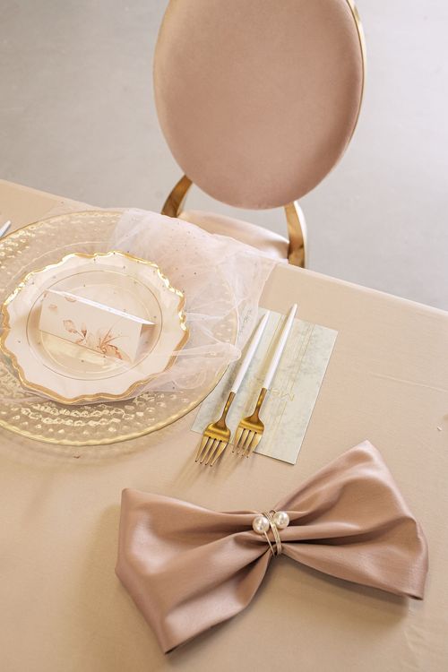 Beige table setting at rectangular table
