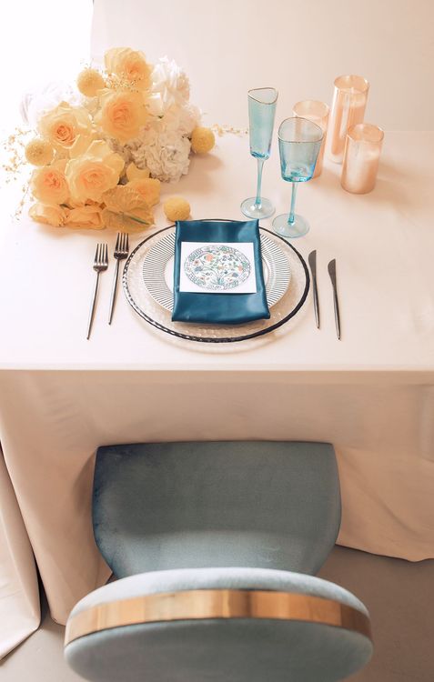 Beige table setting with blue accents