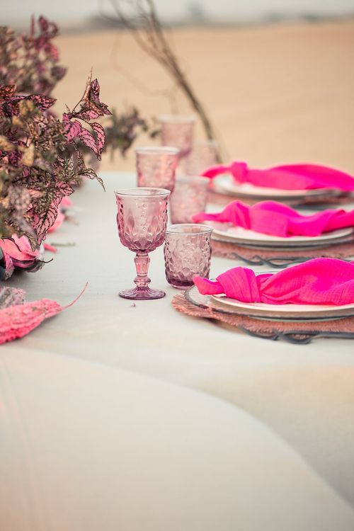 Beige desert  tablescape with fuchsia accents