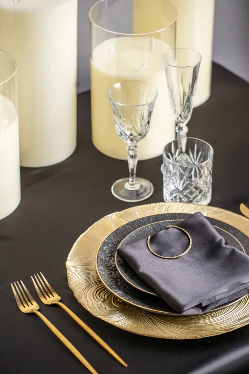 Black and gold table setting