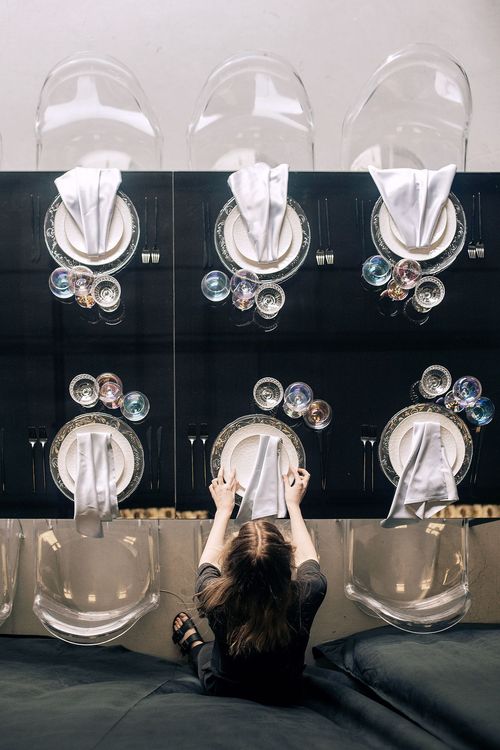 Black-white table setting at rectangular table