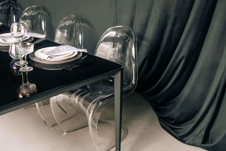 Black-white table setting at rectangular table