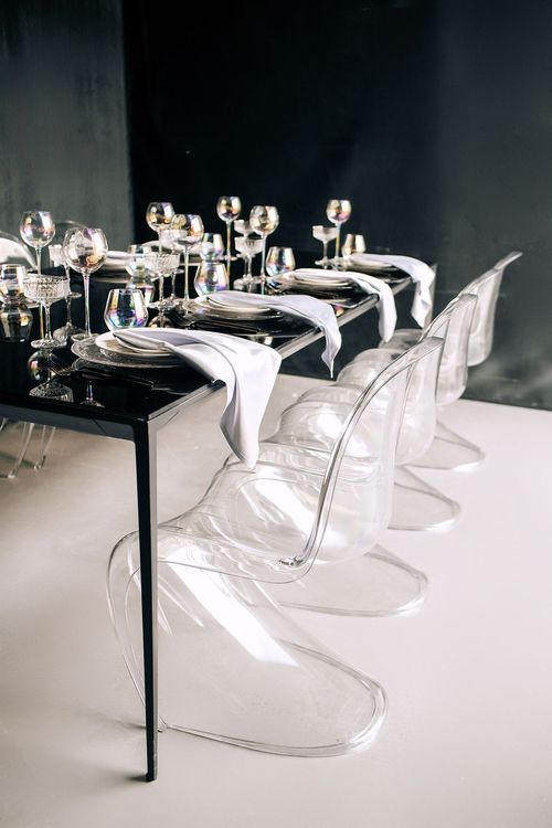 Black-white table setting at rectangular table