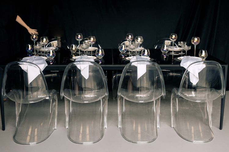 Black-white table setting at rectangular table