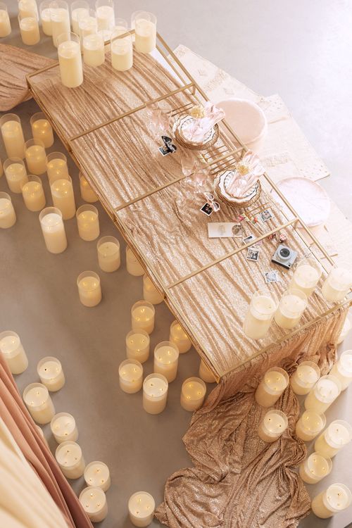 Candlelit Duo — Sequin Table, Cozy Poufs, “Titanic”