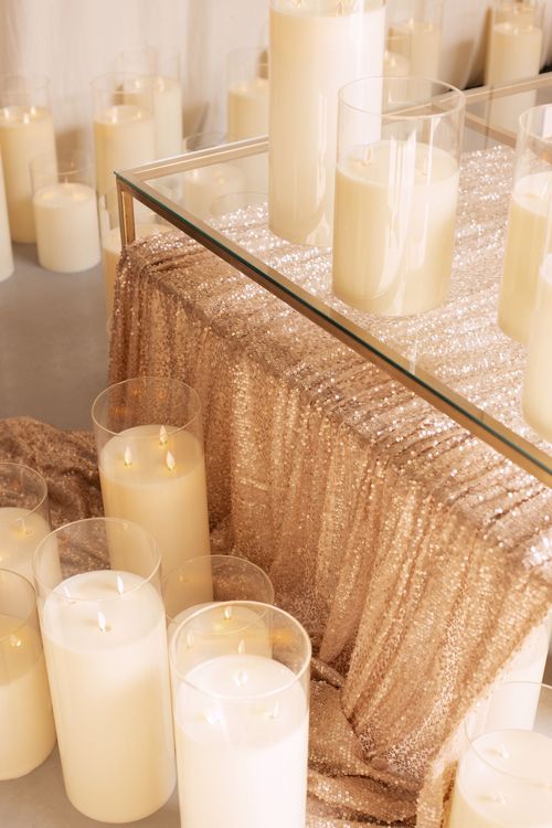 Candlelit Duo — Sequin Table, Cozy Poufs, “Titanic”
