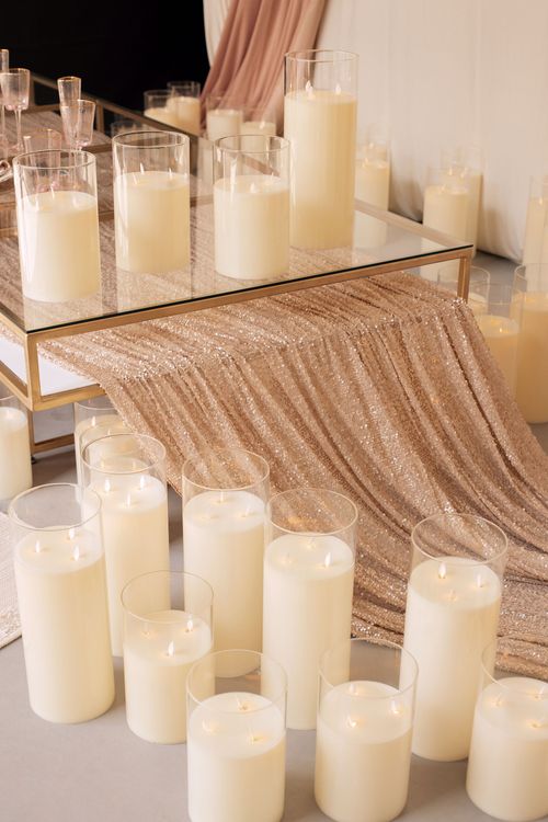 Candlelit Duo — Sequin Table, Cozy Poufs, “Titanic”