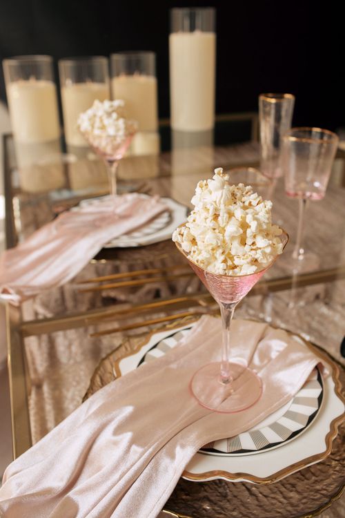 Candlelit Duo — Sequin Table, Cozy Poufs, “Titanic”