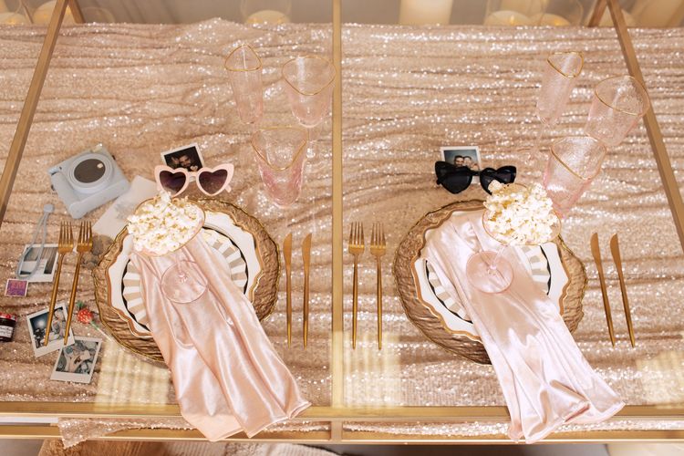 Candlelit Duo — Sequin Table, Cozy Poufs, “Titanic”