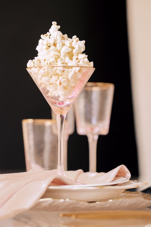 Candlelit Duo — Sequin Table, Cozy Poufs, “Titanic”