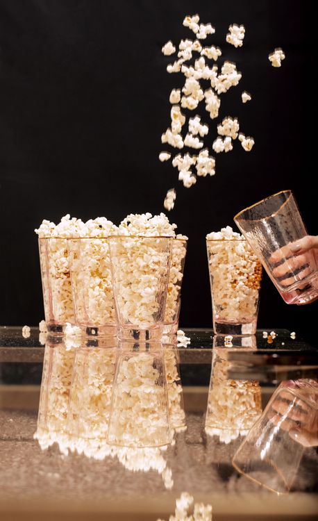 Candlelit Duo — Sequin Table, Cozy Poufs, “Titanic”