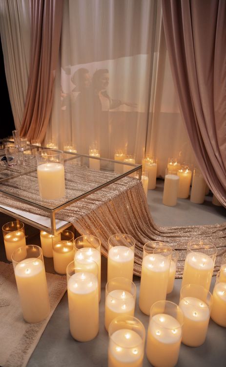 Candlelit Duo — Sequin Table, Cozy Poufs, “Titanic”