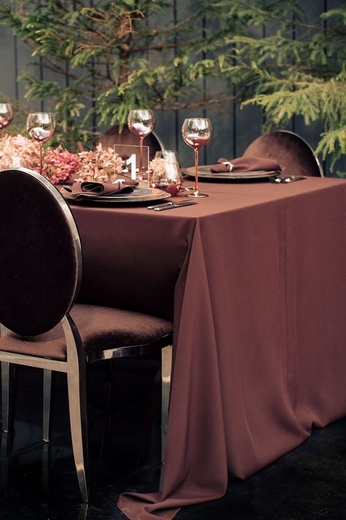 Chocolate table setting at rectangular table