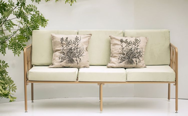 Fern and chocolate lounge setup