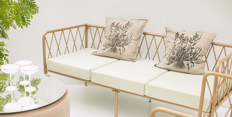 Fern and chocolate lounge setup