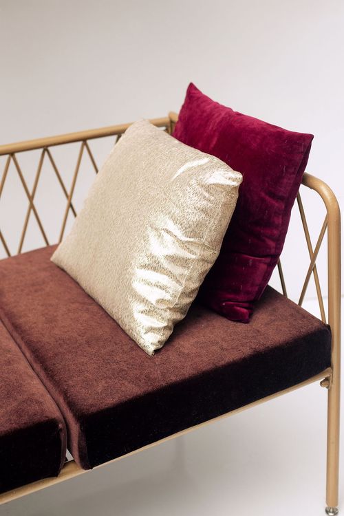 Fern and chocolate lounge setup