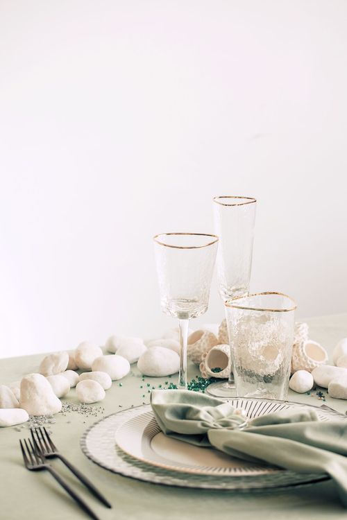 Fern table setting with graphic accents