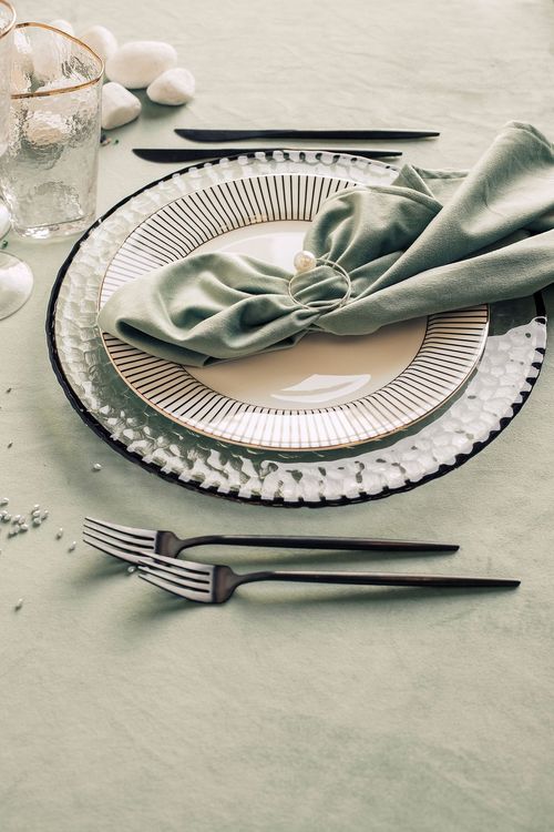 Fern table setting with graphic accents