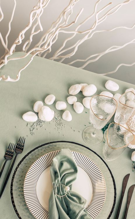 Fern table setting with graphic accents
