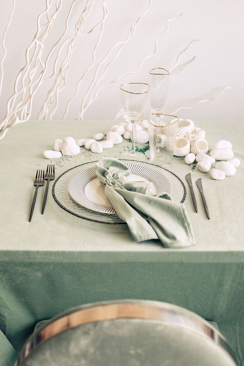 Fern table setting with graphic accents