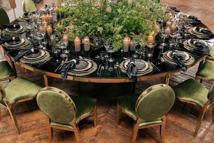 Forest table setting at large round table