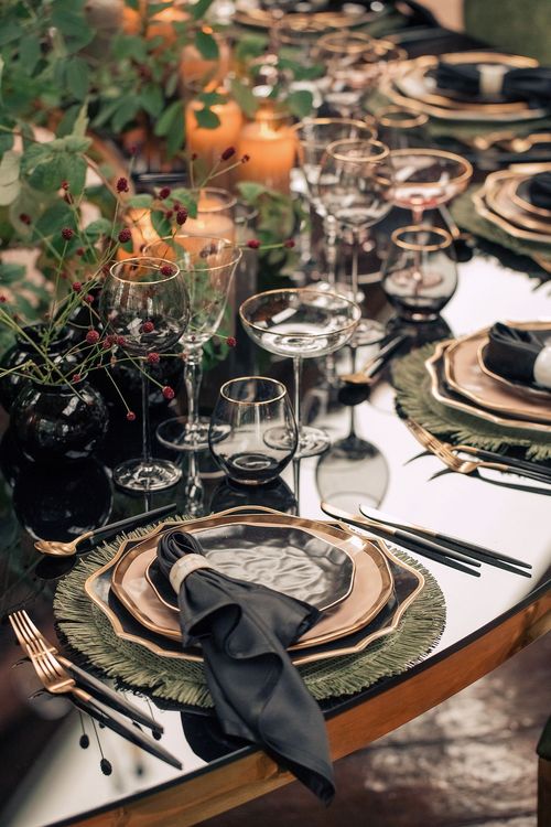 Forest table setting at large round table