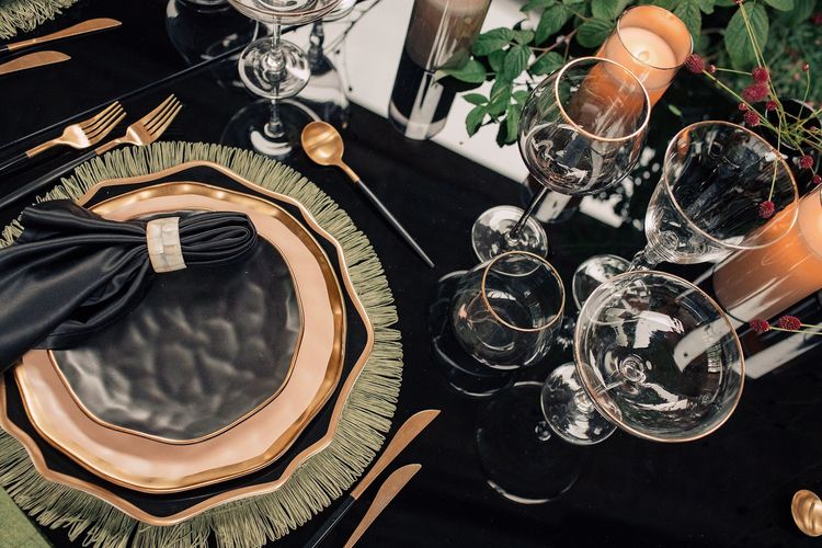 Forest table setting at large round table