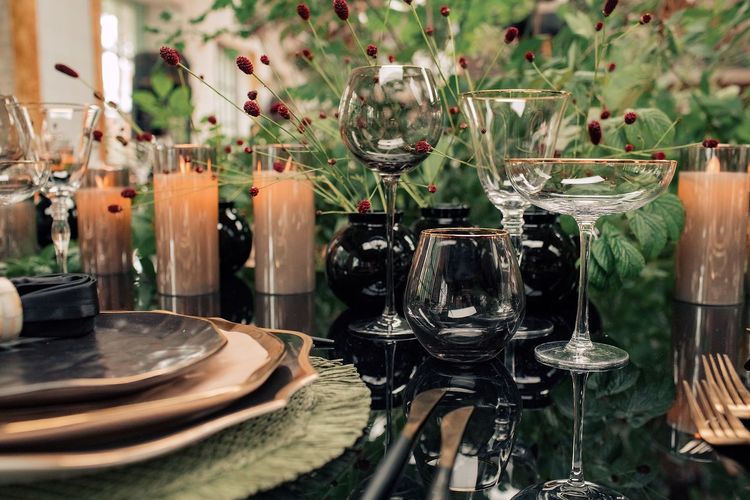 Forest table setting at large round table