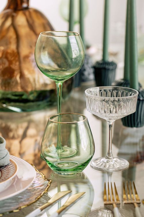 Glass round table coral dune decor