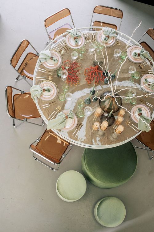 Glass round table coral dune decor