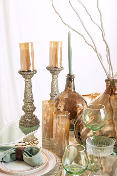 Glass round table coral dune decor