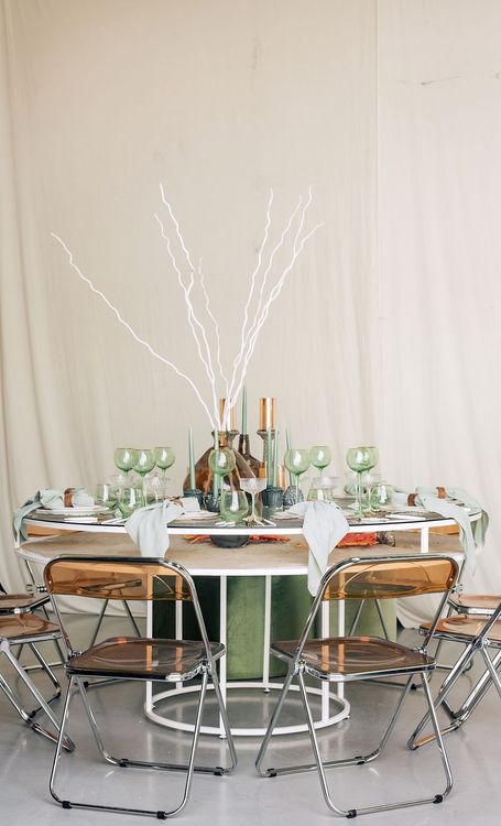 Glass round table coral dune decor