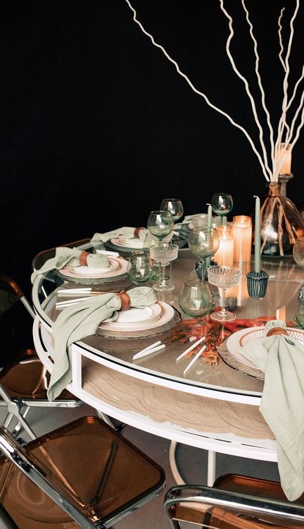 Glass round table coral dune decor