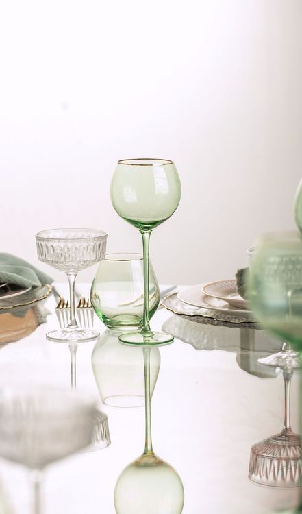 Glass round table coral dune decor