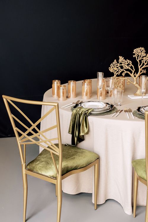 Green table setting at round table