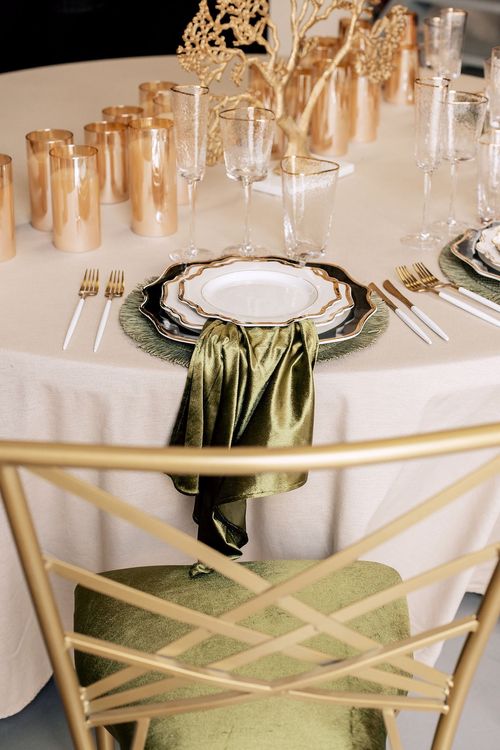 Green table setting at round table