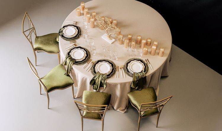 Green table setting at round table