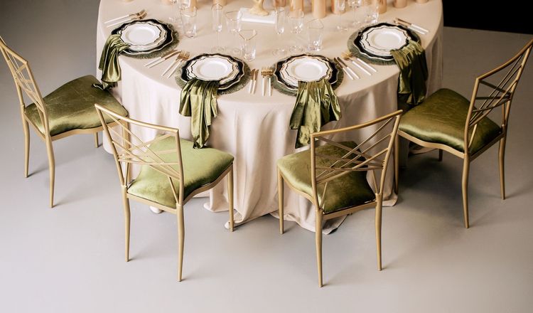 Green table setting at round table