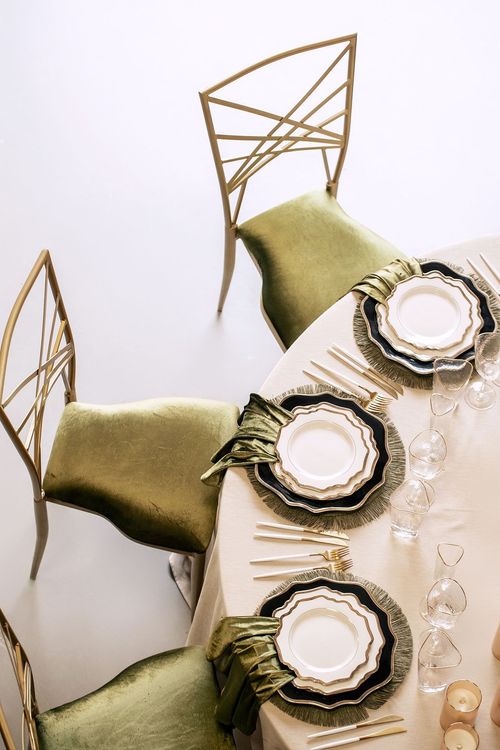 Green table setting at round table