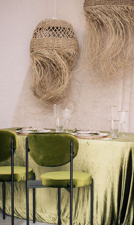 Green velvet tablescape rattan chairs