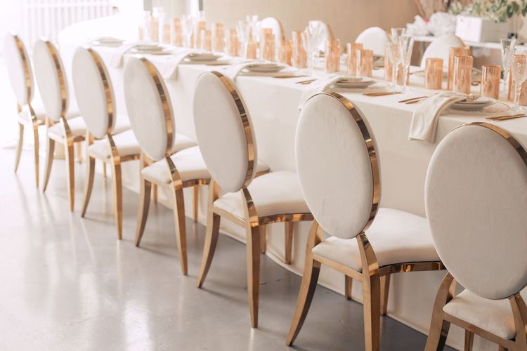 Ivory table service at long rectangular table